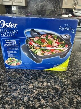 OSTER ELECTRIC SKILLET W REMOVABLE HINGED LID NET